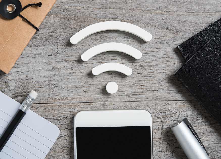 Graphic of a wifi and phone flatlay representing communication options at The Holt holiday cottage